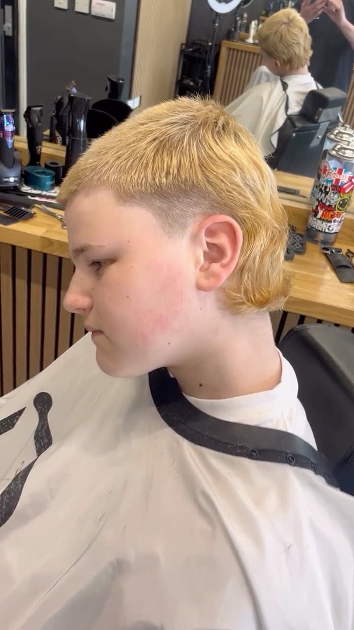 Blonde mullet with a burst fade