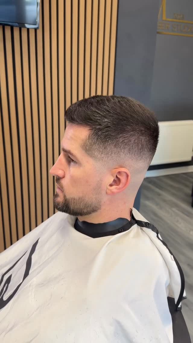 Classic fade with a clean beard line