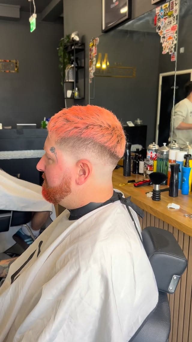 Orange fade with a groomed beard