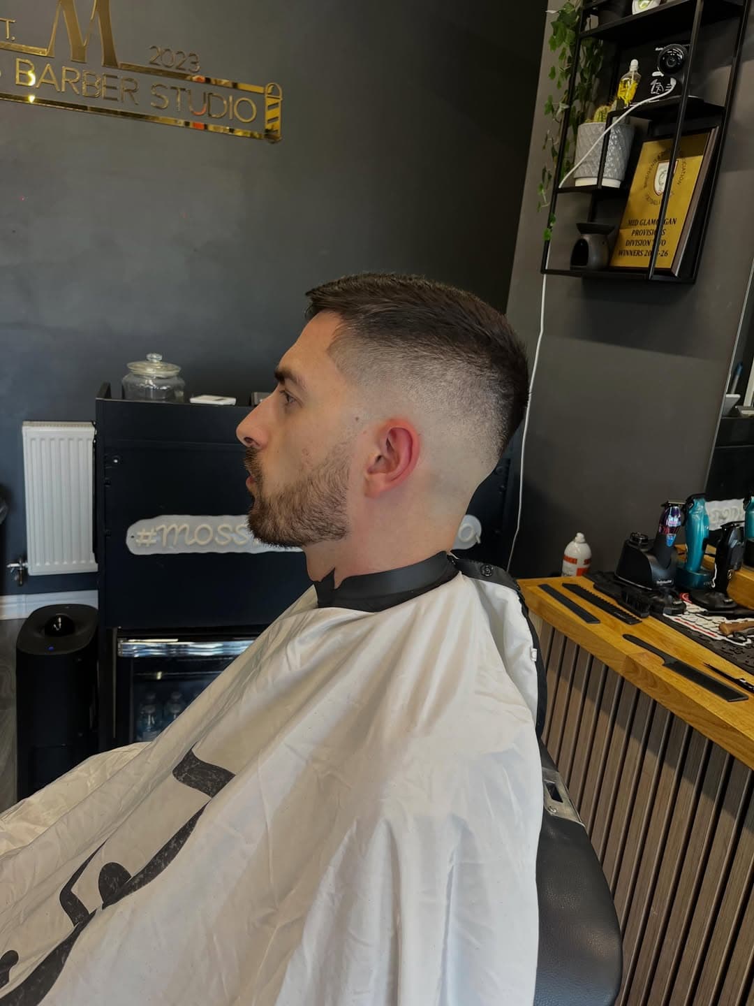 Skin fade and beard, close profile